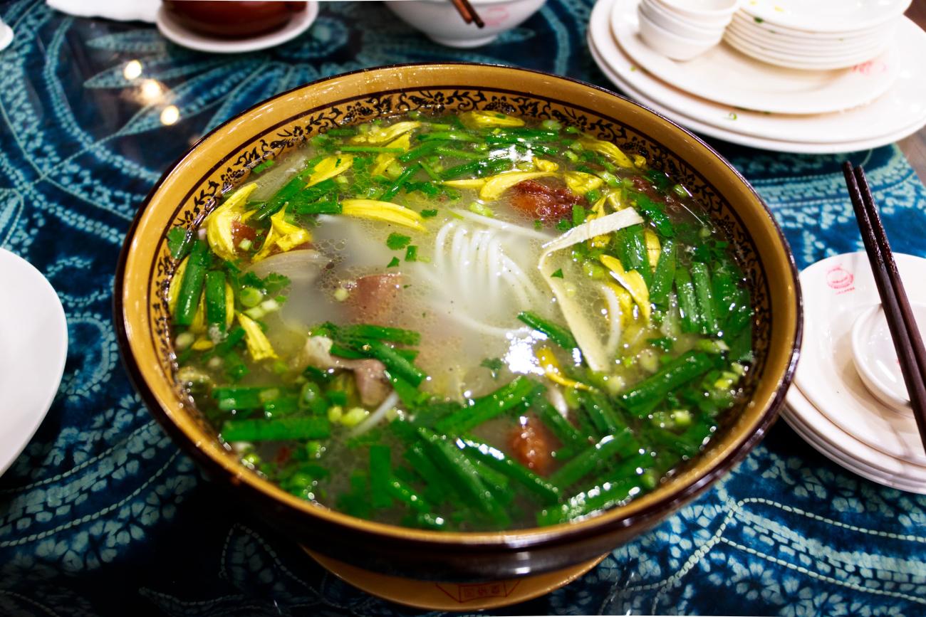 Closeup of Crossing-the-bridge Noodles, a signature Yunnan dish